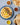 a plate of hummus, pita bread, and a bowl of olive oil