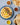 a plate of hummus, pita bread, and a bowl of olive oil