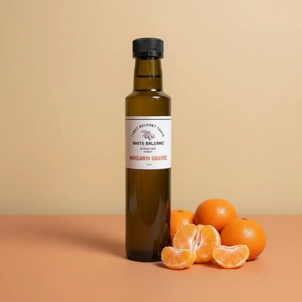 Mandarin Orange White Balsamic Vinegar 250ml bottle on warm terracotta surface