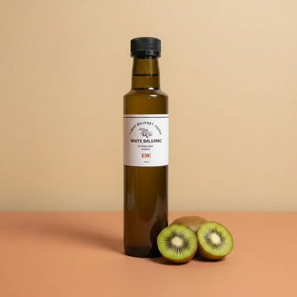 Kiwi White Balsamic Vinegar 250ml bottle on warm terracotta surface