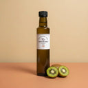 Kiwi White Balsamic Vinegar 250ml bottle on warm terracotta surface