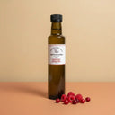 Raspberry Cranberry White Balsamic Vinegar 250ml bottle on warm terracotta surface