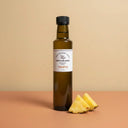 Pineapple Aged White Balsamic Vinegar 250ml bottle on warm terracotta surface