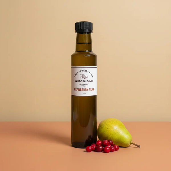 Cranberry Pear White Balsamic Vinegar 250ml bottle on warm terracotta surface