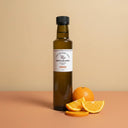 Orange White Balsamic Vinegar 250ml bottle on warm terracotta surface