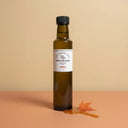 Maple White Balsamic Vinegar 250ml bottle on warm terracotta surface
