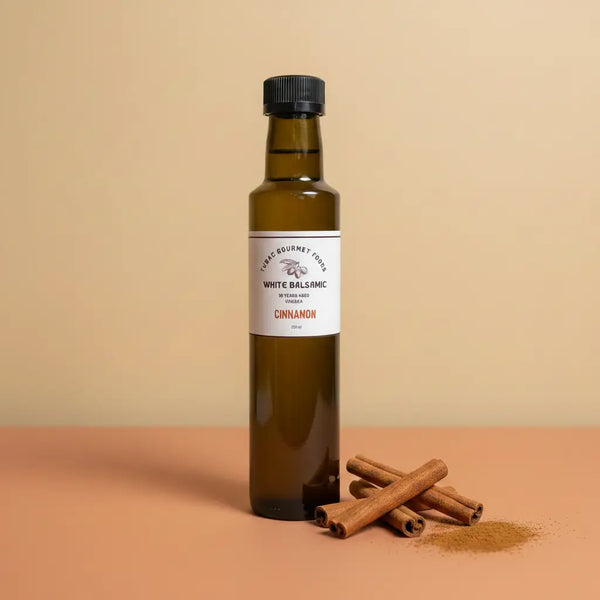 Cinnamon White Balsamic Vinegar 250ml bottle on warm terracotta surface