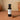 Traditional Aged White Balsamic Vinegar bottle on terracotta surface