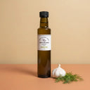 Garlic Dill White Balsamic Vinegar 250ml bottle on warm terracotta surface