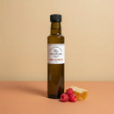 Honey Raspberry Dark Balsamic Vinegar 250ml bottle on warm terracotta surface