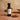 Cinnamon White Balsamic Vinegar bottle with cinnamon sticks on terracotta surface