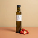 Strawberry White Balsamic Vinegar 250ml bottle on warm terracotta surface