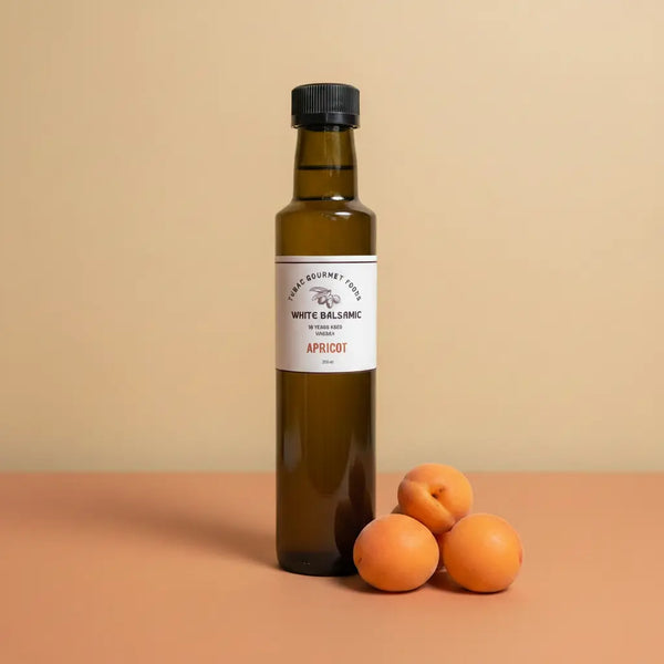 Apricot White Balsamic Vinegar 250ml bottle on warm terracotta surface