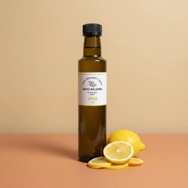 Lemon White Balsamic Vinegar 250ml bottle on warm terracotta surface