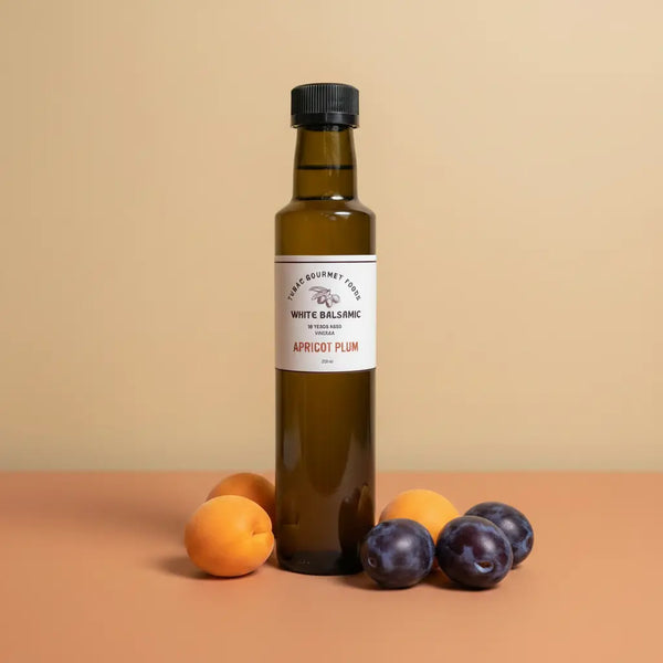 Apricot Plum White Balsamic Vinegar 250ml bottle on warm terracotta surface