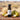 Cinnamon Pear White Balsamic Vinegar bottle with pears and cinnamon sticks on terracotta surface