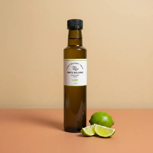 Lime White Balsamic Vinegar 250ml bottle on warm terracotta surface