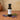 Lavender White Balsamic Vinegar bottle with fresh lavender sprigs on terracotta surface