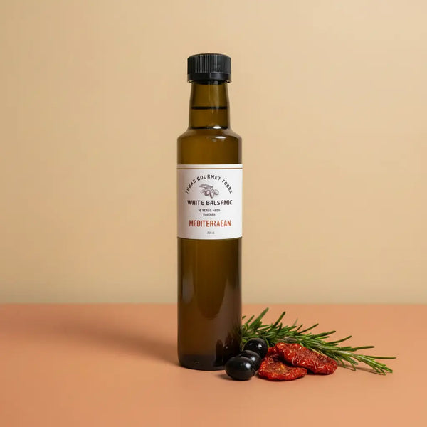 Mediterranean White Balsamic Vinegar 250ml bottle on warm terracotta surface