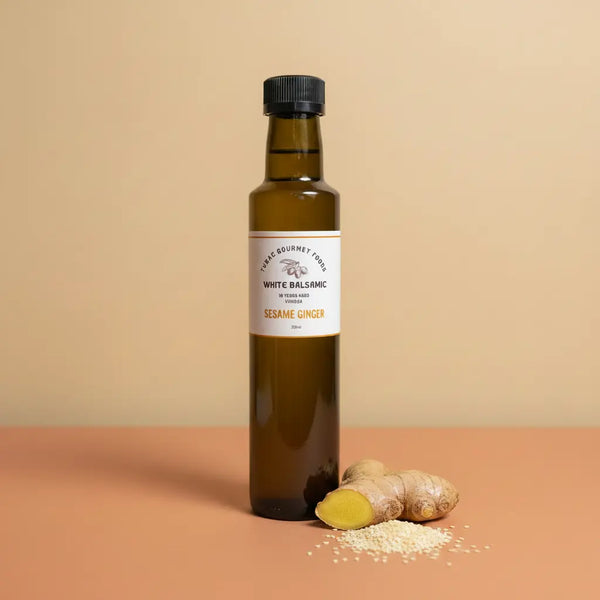 Sesame Ginger White Balsamic 250ml bottle on warm terracotta surface