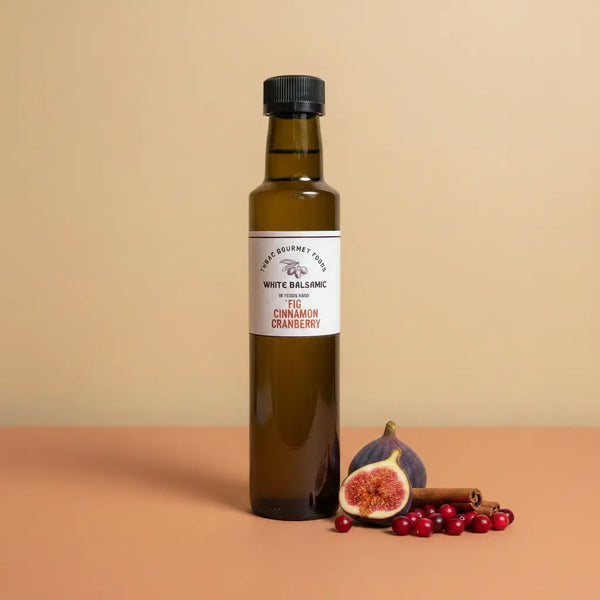 Fig Cinnamon Cranberry White Balsamic Vinegar 250ml bottle on warm terracotta surface