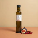 Fig Cinnamon Cranberry White Balsamic Vinegar 250ml bottle on warm terracotta surface