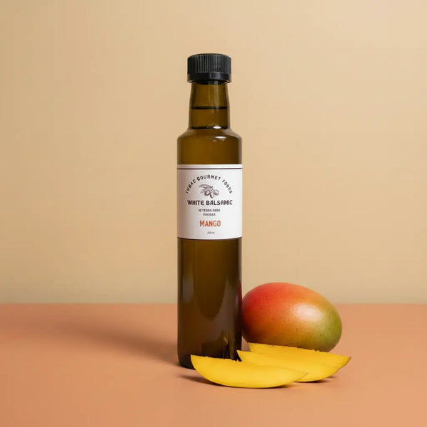 Mango White Balsamic Vinegar 250ml bottle on warm terracotta surface