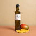 Mango White Balsamic Vinegar 250ml bottle on warm terracotta surface