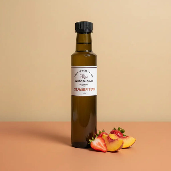 Strawberry Peach White Balsamic Vinegar 250ml bottle on warm terracotta surface