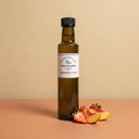 Strawberry Peach White Balsamic Vinegar 250ml bottle on warm terracotta surface
