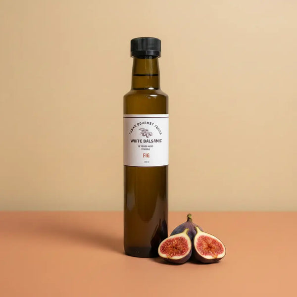Fig White Balsamic Vinegar 250ml bottle on warm terracotta surface