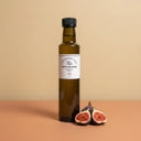 Fig White Balsamic Vinegar 250ml bottle on warm terracotta surface