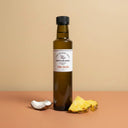 Pina Colada White Balsamic Vinegar 250ml bottle on warm terracotta surface