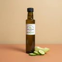 Cucumber Melon White Balsamic Vinegar 250ml bottle on warm terracotta surface